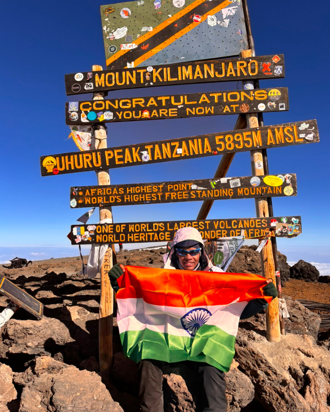 Kilimanjaro trekking company expedition team assisting climbers on the scenic Lemosho Route of Mount Kilimanjaro