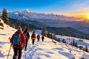 Winter trekking in Auli Uttarakhand with snow-covered Himalayan mountains at sunrise